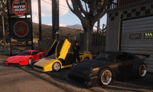 several cars are parked in front of an auto shop sign