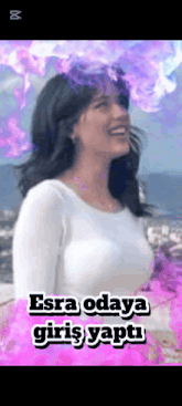 a woman in a white shirt is surrounded by purple flowers and the words " esra odaya "