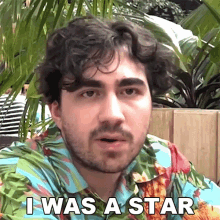 a man in a hawaiian shirt is saying i was a star