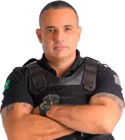 a man with his arms crossed wearing a vest that says delegado