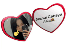 a heart shaped mirror that says jinsoul cahaya asia on it