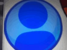 a blue circle with a person 's face on it