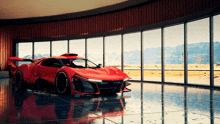 a red sports car is parked in a room with a lot of windows