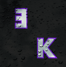 a black background with purple letters e and k