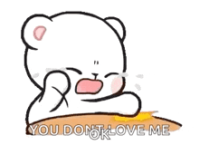 a cartoon of a teddy bear crying while sitting on a table .