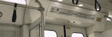 a close up of the inside of a subway car .