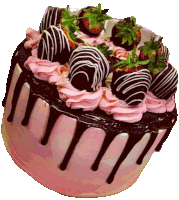 a cake with chocolate covered strawberries on top of it