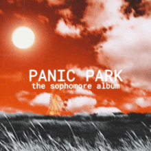 panic park the sophomore album cover with a ferris wheel in the distance