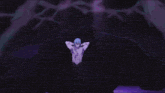 a man with long purple hair is standing in a dark room .
