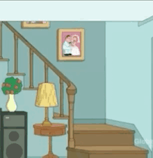 a cartoon of a living room with stairs , a table , a lamp , and a picture on the wall .