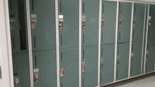 a row of lockers in a locker room with a sticker on one that says ' a ' on it