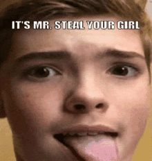 a young boy sticking his tongue out with a caption that says it 's mr. steal your girl