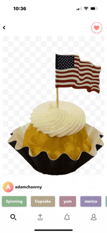 a cupcake with an american flag on top of it