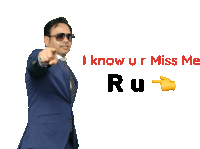 a man in a suit and tie pointing at the camera with the words " i know u r miss me ru "