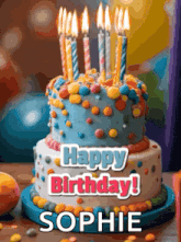 a birthday cake with candles and the words happy birthday sophie