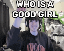 a man wearing headphones with the words who is a good girl