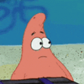 a cartoon of patrick star from spongebob squarepants with a sad look on his face .