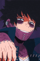 a close up of a person wearing a purple mask and a blue jacket .