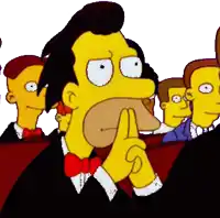 a group of men are sitting in a row and one of them has a finger on his mouth