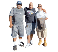 a man wearing a shirt that says fast and furious stands with two other men