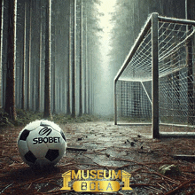 a soccer ball that says ' sbobet ' on it is in the middle of a forest