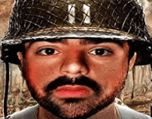 a man with a beard is wearing a military helmet