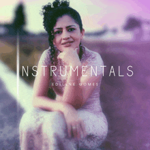 a woman sits on the cover of an album titled instrumentals