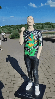 a statue of a man with kappa on his shirt