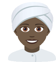 a woman with a white turban on her head smiles