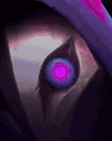 a close up of a person with a purple eye