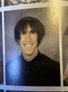 a close up of a man 's face in a yearbook photo