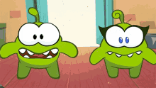 two green cartoon characters are standing next to each other and one has glasses on