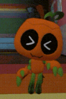 a stuffed toy of a pumpkin with black eyes and green legs