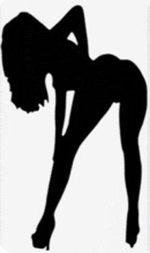 a black and white silhouette of a woman bending over