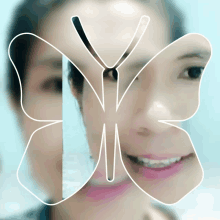 a butterfly is drawn over a woman 's face in a blurry photo