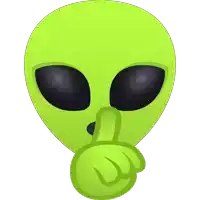 a green alien with a finger on its mouth