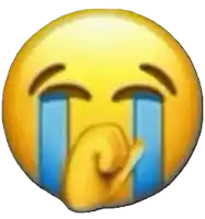 a yellow smiley face with tears coming out of its eyes