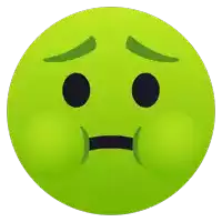 a green smiley face with a sad expression on its face