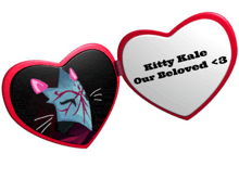 a heart shaped mirror says kitty kale our beloved