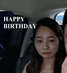 a woman sitting in a car with the words happy birthday behind her