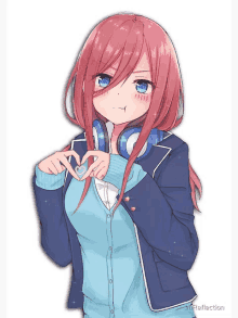 a girl wearing headphones is making a heart with her hands