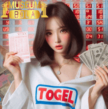 a woman in a white shirt that says ' togel '