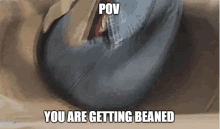 a picture of a person with a caption that says " pov you are getting beaned "