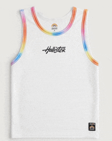 a white tank top with hollister written on the front