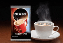 a package of nescafe signature blend next to a cup of coffee on a saucer