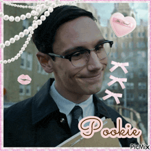 a picture of a man with glasses and the name pookie on the bottom