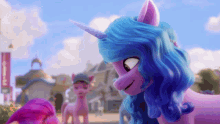 a purple pony with blue hair and a horn