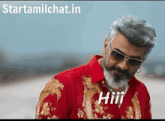 a man with a beard wearing sunglasses and a red shirt with the word hiii on it