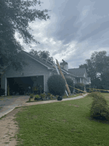 a man on a ladder is working on a roof