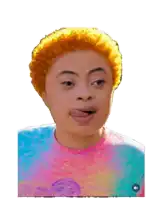 a person with down syndrome is wearing a tie dye shirt and making a funny face